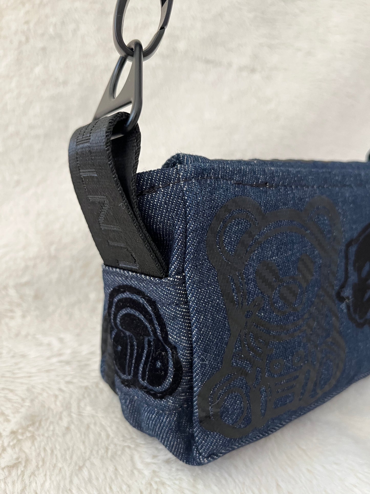mini lion on denim couture bag, one off
