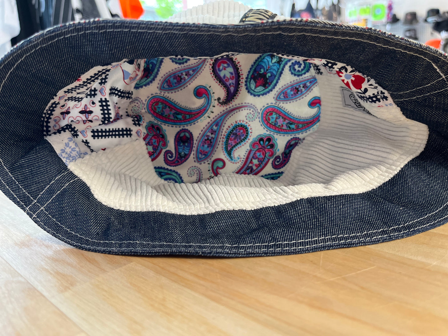 reversible black laced corduroy bucket hat / short brim