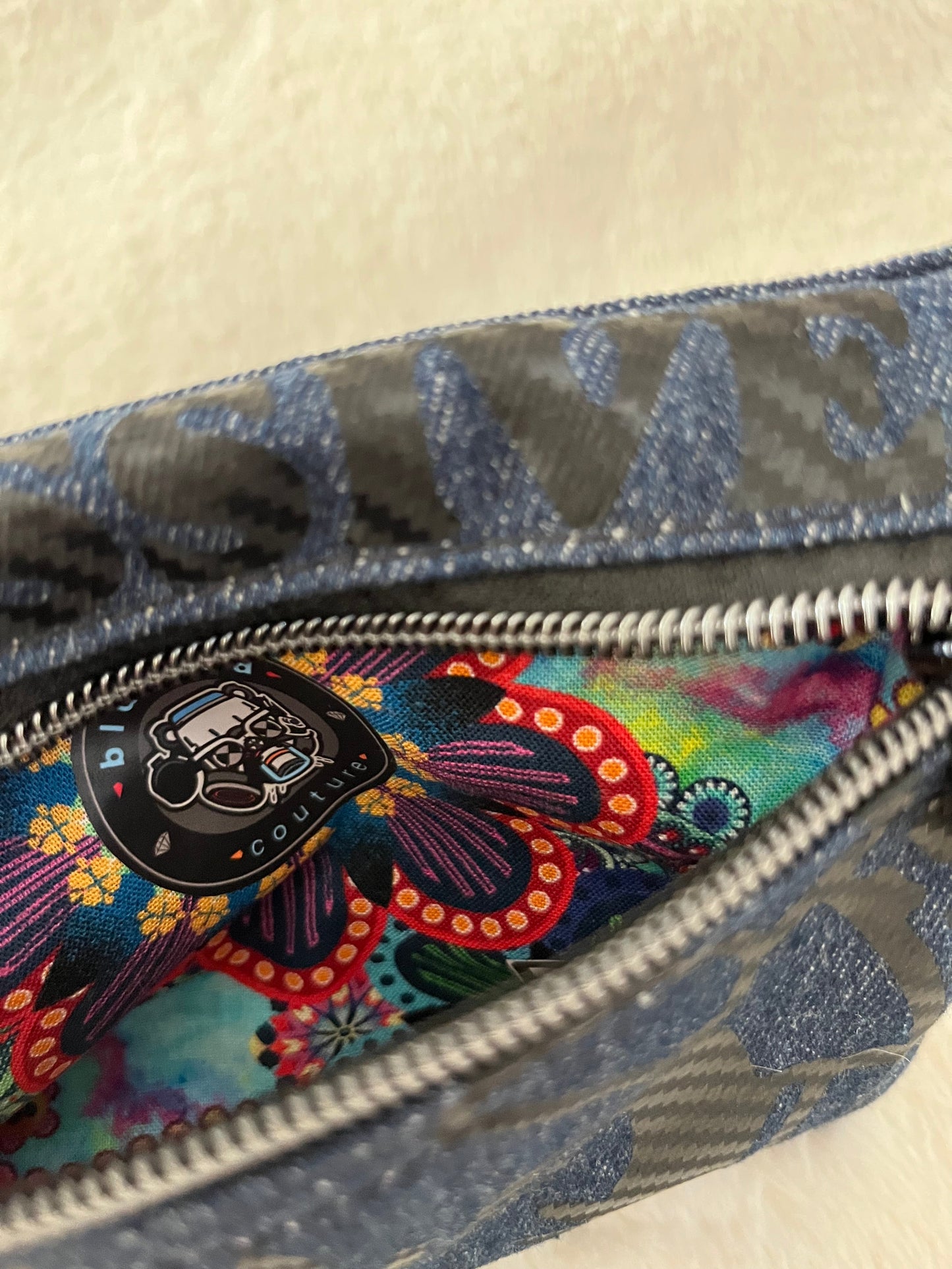 mini lion on denim couture bag, one off