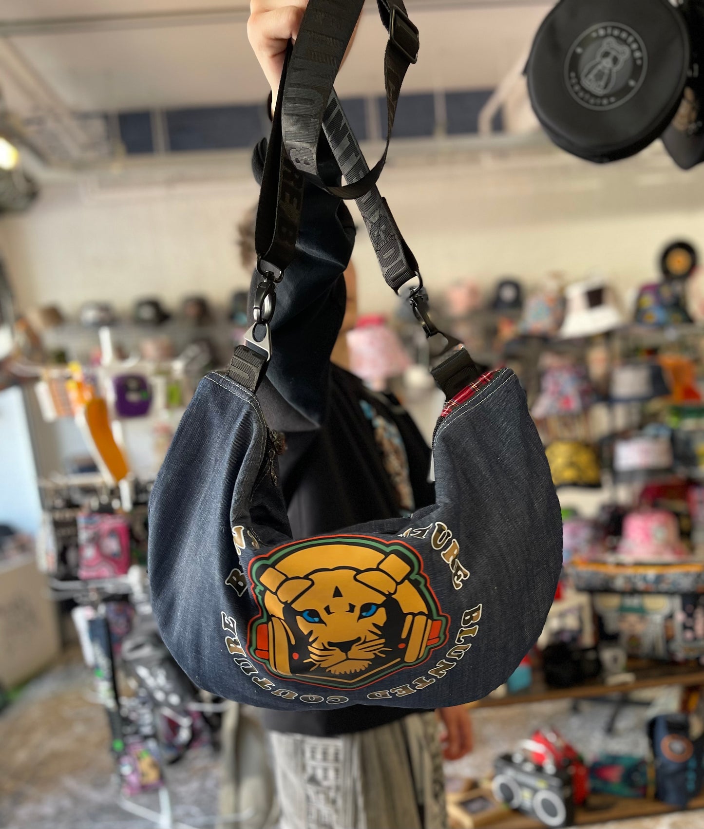 blunted couture fully lined slouch bag lion