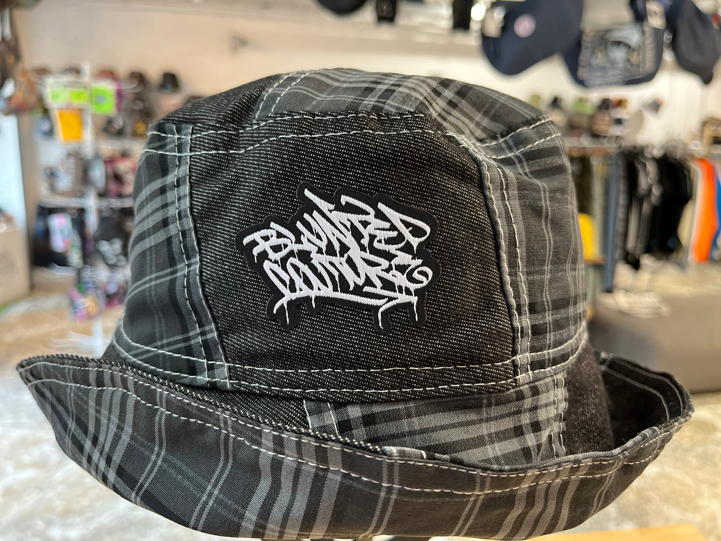 reversible black tartan bucket hat