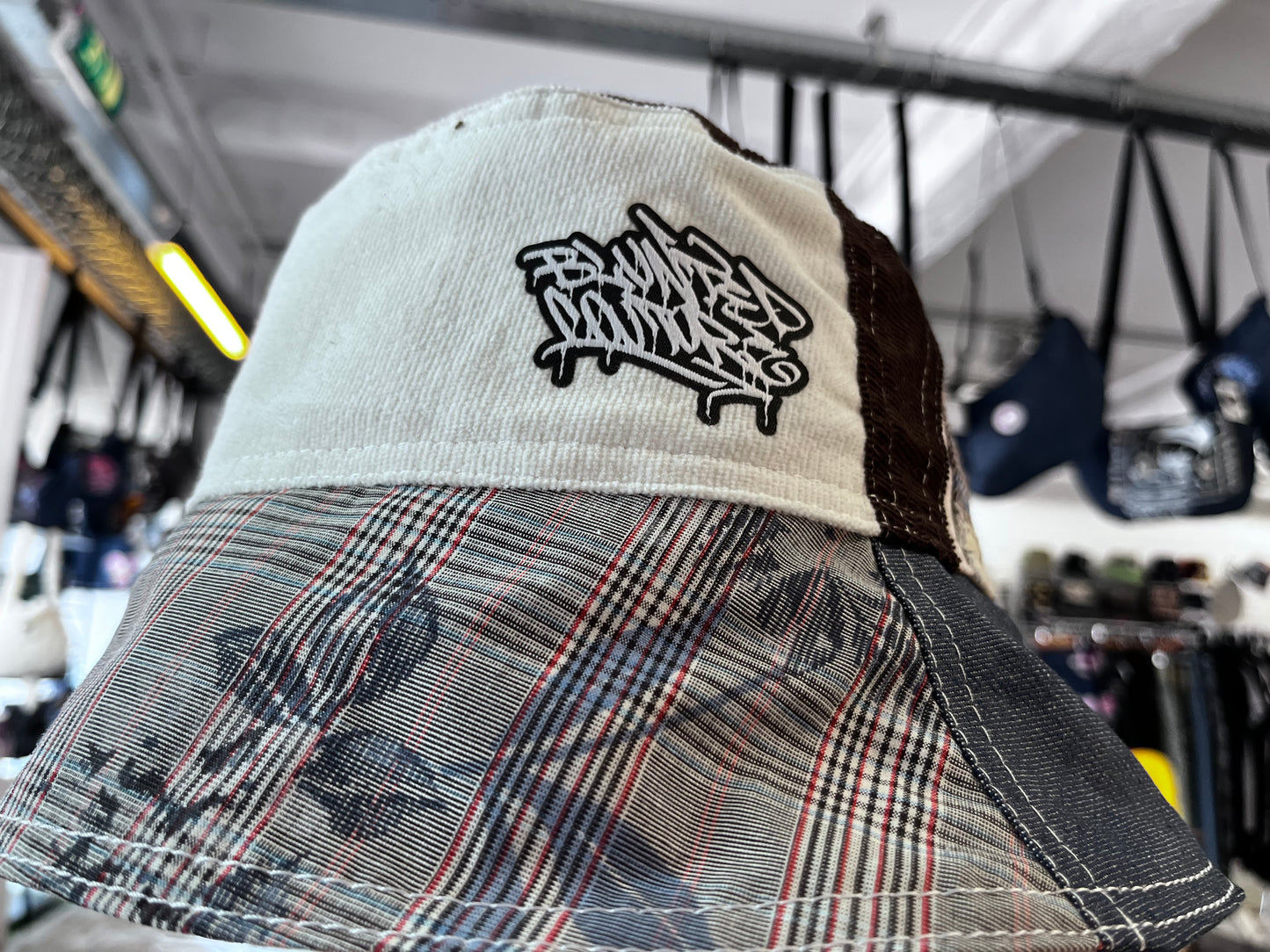 reversible tartan Mixie with cord bucket hat