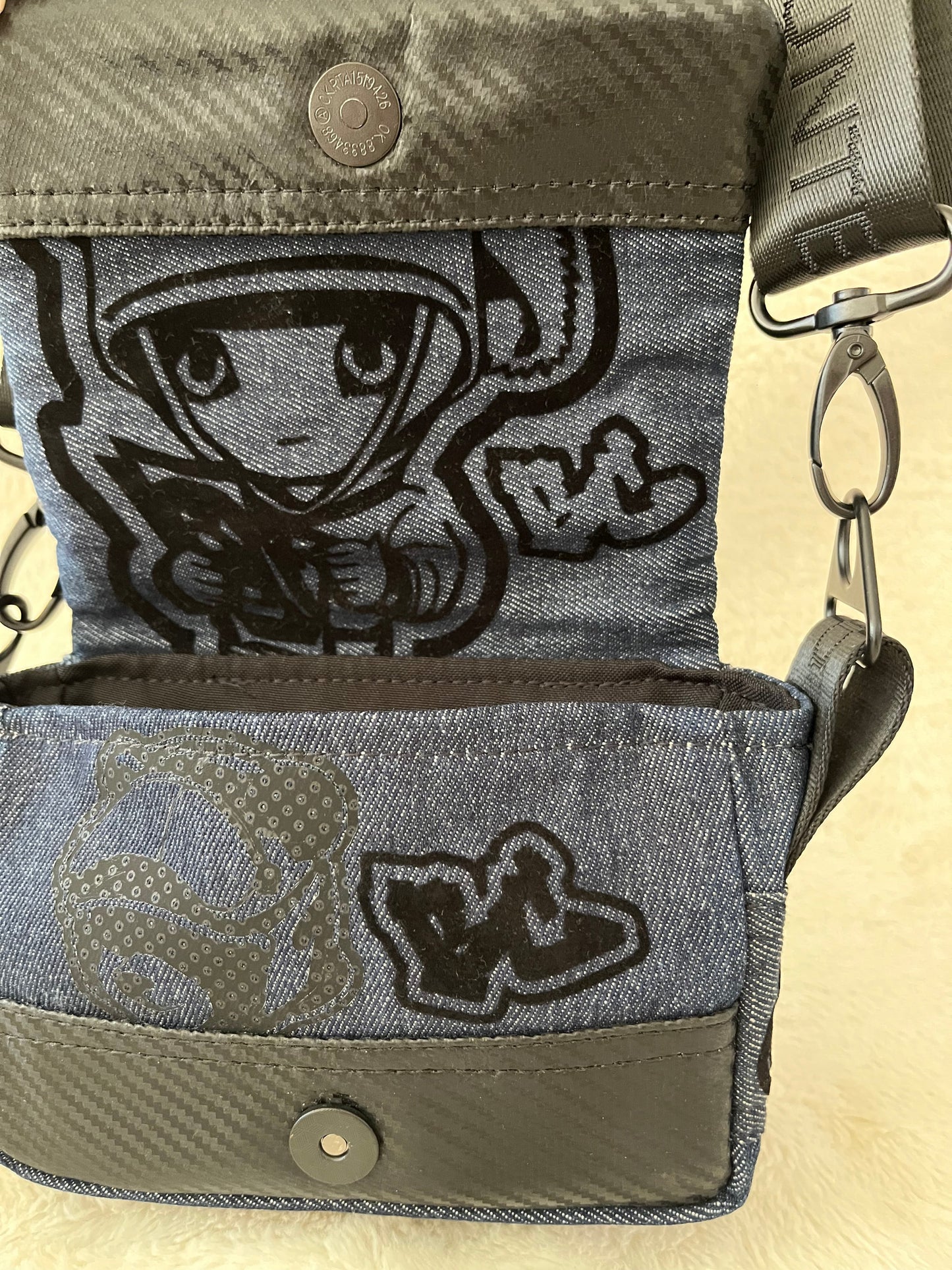 mini lion on denim couture bag, one off